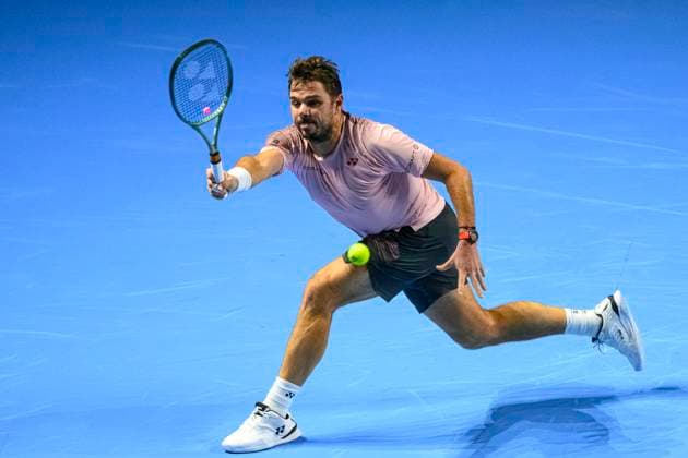 Basel, Switzerland - October 23: Stan Wawrinka of Switzerland stretches to play the forehand against Adrian Mannarino of France during the Swiss Indoors Basel - Day 3 at St. Jakobshalle on October 23, 2024 in Basel, Switzerland. (Photo by JustPictures) Basel St. Jakobshalle Basel-Stadt Switzerland