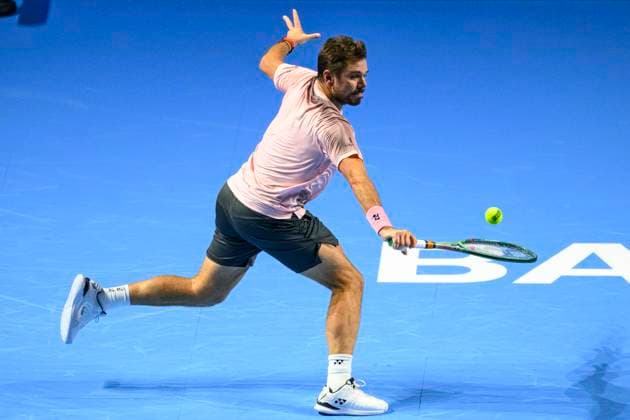 Basel, Switzerland - October 23: Stan Wawrinka of Switzerland plays a backhand against Adrian Mannarino of France during the Swiss Indoors Basel - Day 3 at St. Jakobshalle on October 23, 2024 in Basel, Switzerland. (Photo by JustPictures) Basel St. Jakobshalle Basel-Stadt Switzerland