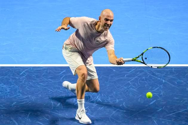 Basel, Switzerland - October 23: Adrian Mannarino of France plays a forehand against Stan Wawrinka of Switzerland during the Swiss Indoors Basel - Day 3 at St. Jakobshalle on October 23, 2024 in Basel, Switzerland. (Photo by JustPictures) Basel St. Jakobshalle Basel-Stadt Switzerland