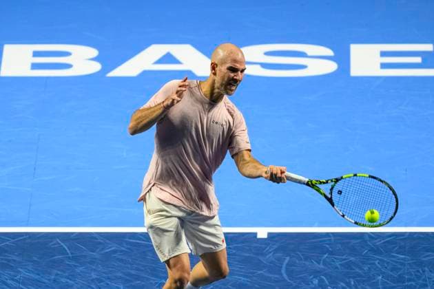 Basel, Switzerland - October 23: Adrian Mannarino of France plays a forehand against Stan Wawrinka of Switzerland during the Swiss Indoors Basel - Day 3 at St. Jakobshalle on October 23, 2024 in Basel, Switzerland. (Photo by JustPictures) Basel St. Jakobshalle Basel-Stadt Switzerland