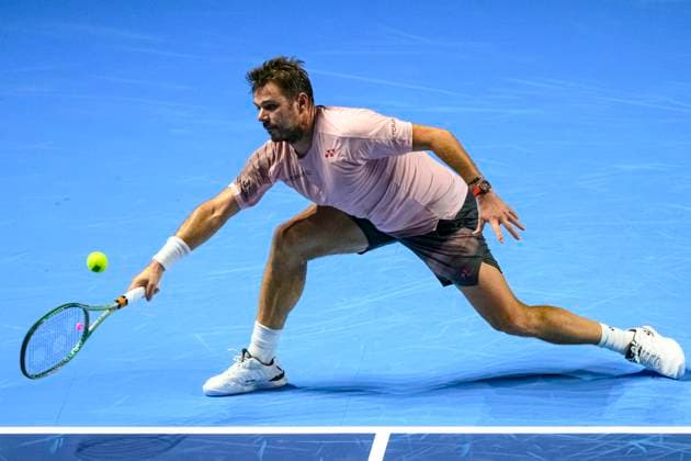 Basel, Switzerland - October 23: Stan Wawrinka of Switzerland stretches to play the forehand against Adrian Mannarino of France during the Swiss Indoors Basel - Day 3 at St. Jakobshalle on October 23, 2024 in Basel, Switzerland. (Photo by JustPictures) Basel St. Jakobshalle Basel-Stadt Switzerland