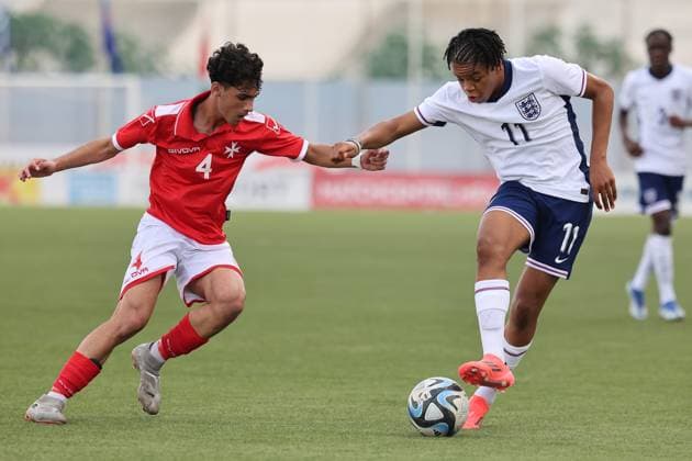 TA™ QALI, MALTA - OCTOBER 24: Rio Ngumoha (R) of England takes on Matteas Caruana of Malta during the UEFA European Under-17 Championship 2025 Group 1 qualifying soccer match between England and Malta at the Centenary Stadium, Ta™ Qali, Malta on October 24, 2024. England v Malta - Under-17 Championship UEFA Qualifying 2025 UEFA_U17_QLFY_25