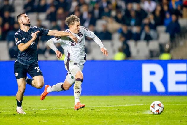 BAKOE, 24-10-2024, Tofiq Bahramov Stadium , season 2024 2025 , Europa League match between FK Qarabag and Ajax . Qarabag player Abbas Huseynov and Ajax player Mika Godts Qarabag - Ajax  x26553353x Copyright: