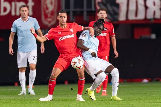 2024-10-24 FC Twente v S.S. Lazio - UEFA Europa League 2024 25 League Phase MD3 ENSCHEDE, NETHERLANDS - OCTOBER 24: Anass Salah-Eddine of FC Twente battles for the ball with Loum Tchaouna of SS Lazio during the UEFA Europa League 2024 25 League Phase MD3 match between FC Twente and S.S. Lazio at FC Twente Stadium on October 24, 2024 in Enschede, Netherlands. (Photo by Joris Verwijst BSR Agency) Enschede Netherlands Content not available for redistribution in The Netherlands directly or indirectly through any third parties. Copyright: xBSRxAgencyx