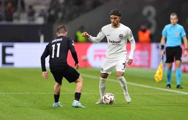 24.10.2024, Fussball UEFA Europa League, Eintracht Frankfurt - FC Riga FS RFS, emonline, emspor, v.l., Roberts Savalnieks (FK RFS), Omar Marmoush (Eintracht Frankfurt) DFL DFB REGULATIONS PROHIBIT ANY USE OF PHOTOGRAPHS AS IMAGE SEQUENCES AND OR QUASI-VIDEO. xdcx Copyright: HMBxMedia
