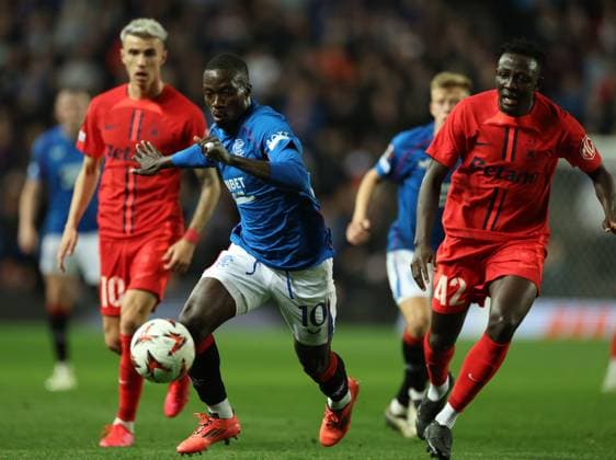 Mohamed Diomande of Rangers and Octavian Popescu and Baba Alhassan of FCSB during the Europa League group phase match at Ibrox Stadium, Glasgow. Rangers v FCSB, UEFA Europa League, Group Stage, Football, Ibrox Stadium, Glasgow, Scotland, UK, 24 Oct 2024 EDITORIAL USE ONLY No use with unauthorised audio, video, data, fixture lists, club league logos or live services. Online in-match use limited to 120 images, no video emulation. No use in betting, games or single club league player publications. Copyright: xKirkxO Rourke RangersxFC Shutterstockx 14816713dh