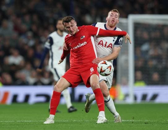London, England, 24th October 2024. Peer Koopmeiners of AZ Alkmaar and Dejan Kulusevski of Tottenham Hotspur challenge for the ball during the UEFA Europa League match at the Tottenham Hotspur Stadium, London. Picture credit should read: Paul Terry Sportimage EDITORIAL USE ONLY. No use with unauthorised audio, video, data, fixture lists, club league logos or live services. Online in-match use limited to 120 images, no video emulation. No use in betting, games or single club league player publications. SPI-3406-0045