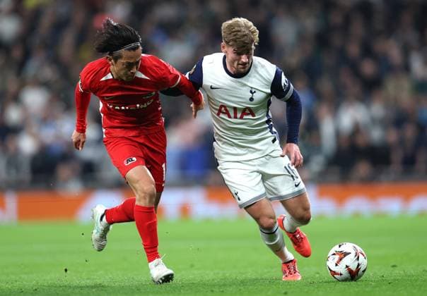 London, England, 24th October 2024. Seiya Maikuma of AZ Alkmaar and Timo Werner of Tottenham Hotspur challenge for the ball during the UEFA Europa League match at the Tottenham Hotspur Stadium, London. Picture credit should read: Paul Terry Sportimage EDITORIAL USE ONLY. No use with unauthorised audio, video, data, fixture lists, club league logos or live services. Online in-match use limited to 120 images, no video emulation. No use in betting, games or single club league player publications. SPI-3406-0051