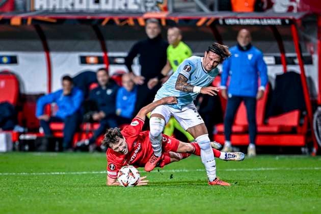 FC Twente midfielder Youri Regeer, Lazio defender Luca Pellegrini, during the match Twente - Lazio at the Grolsch Veste for the UEFA Europa League - League phase - Matchday 3 season 2024-2025 in ENSCHEDE, Netherlands on 24 oktober 2024, (photo by Stefan Koops EYE4images DeFodi Images) not used in POL SRB CRO FRA GBR NED ITA USA Defodi-746_196831