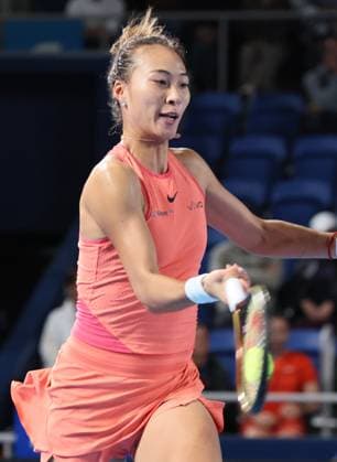 October 25, 2024, Tokyo , Japan - Zheng Qinwen of China returns the ball against Leylah Fernandez of Canada at the quarter final match of the Toray Pan Pacific Open tennis tournament at the Ariake Colosseum in Tokyo on Friday, October 25, 2024. The first seeded Zheng defeated Fernandez. (photo by Yoshio Tsunoda AFLO) Noxthirdxpartyxsales  (0775273273st)