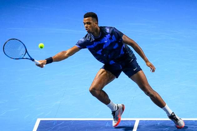 BASEL, SWITZERLAND - OCTOBER 26: Giovanni Mpetshi Perricard of France stretches to play the forehand against Holger Rune of Norway during the Swiss Indoors Basel - Day 6 at St. Jakobshalle on October 26, 2024 in Basel, Switzerland. (Photo by JustPictures) Basel St. Jakobshalle Basel-Stadt Switzerland