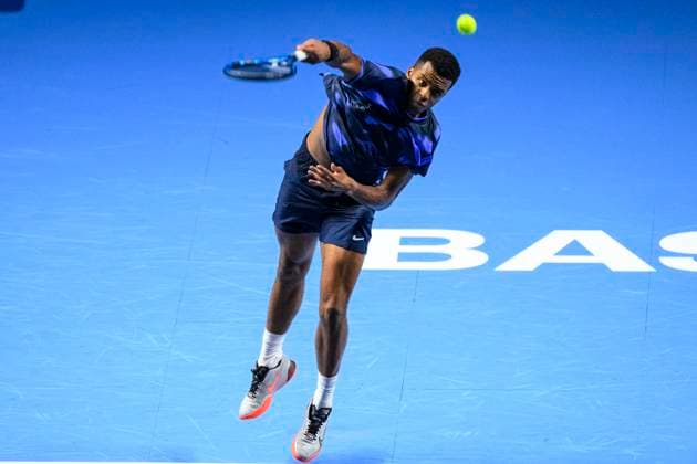 BASEL, SWITZERLAND - OCTOBER 26: Giovanni Mpetshi Perricard of France serves the ball against Holger Rune of Norway during the Swiss Indoors Basel - Day 6 at St. Jakobshalle on October 26, 2024 in Basel, Switzerland. (Photo by JustPictures) Basel St. Jakobshalle Basel-Stadt Switzerland