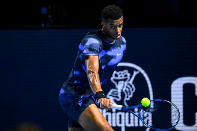 BASEL, SWITZERLAND - OCTOBER 26: Giovanni Mpetshi Perricard of France plays a backhand against Holger Rune of Norway during the Swiss Indoors Basel - Day 6 at St. Jakobshalle on October 26, 2024 in Basel, Switzerland. (Photo by JustPictures) Basel St. Jakobshalle Basel-Stadt Switzerland