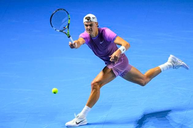 BASEL, SWITZERLAND - OCTOBER 26: Holger Rune of Norway stretches to play the forehand against Giovanni Mpetshi Perricard of France during the Swiss Indoors Basel - Day 6 at St. Jakobshalle on October 26, 2024 in Basel, Switzerland. (Photo by JustPictures) Basel St. Jakobshalle Basel-Stadt Switzerland