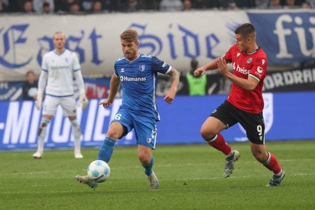 27.10.2024, xgox, Fussball 2. Bundesliga, 1. FC Magdeburg - Hannover 96 emspor, v.l. Marcus Mathisen (Magdeburg, 16), Nicolo Tresoldi (Hannover, 9) (DFL DFB REGULATIONS PROHIBIT ANY USE OF PHOTOGRAPHS as IMAGE SEQUENCES and or QUASI-VIDEO) Magdeburg