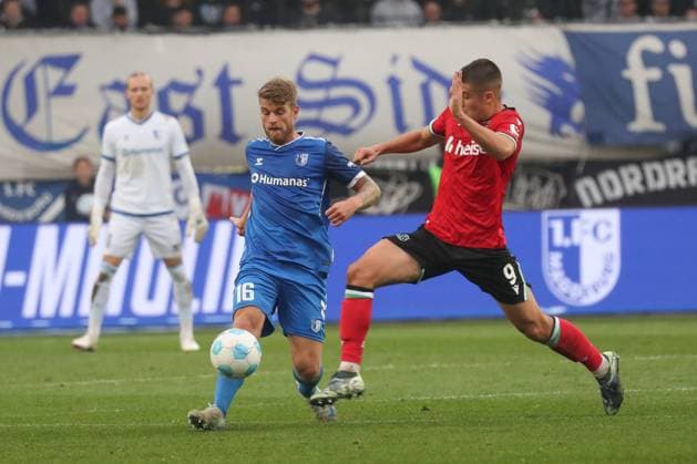 27.10.2024, xgox, Fussball 2. Bundesliga, 1. FC Magdeburg - Hannover 96 emspor, v.l. Marcus Mathisen (Magdeburg, 16), Nicolo Tresoldi (Hannover, 9) (DFL DFB REGULATIONS PROHIBIT ANY USE OF PHOTOGRAPHS as IMAGE SEQUENCES and or QUASI-VIDEO) Magdeburg