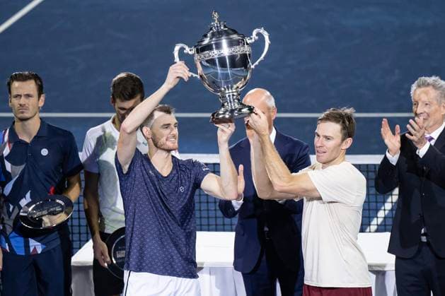 27th October 2024; St. Jakobshalle, Basel, Switzerland; ATP, Tennis Herren 500 Swiss Indoors Basel Tennis, Day 7; Jamie Murray (GBR) and John Peers (AUS) lift the winners trophy after the match against Wesley Koolhof (NED) and Nikola Metic (CRO) in the final of the doubles  ActionPlus12709106 DavidxEmm