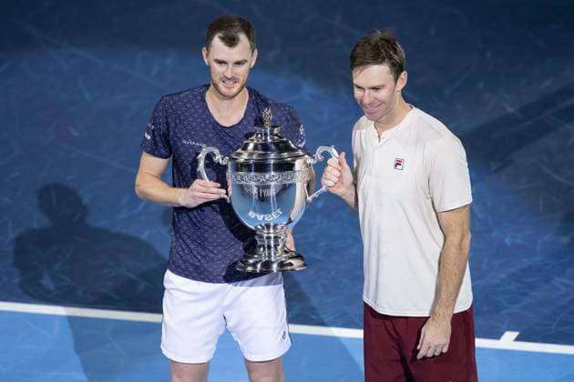27th October 2024; St. Jakobshalle, Basel, Switzerland; ATP, Tennis Herren 500 Swiss Indoors Basel Tennis, Day 7; Jamie Murray (GBR) and John Peers (AUS) lift the winners trophy after the match against Wesley Koolhof (NED) and Nikola Metic (CRO) in the final of the doubles  ActionPlus12709107 DavidxEmm