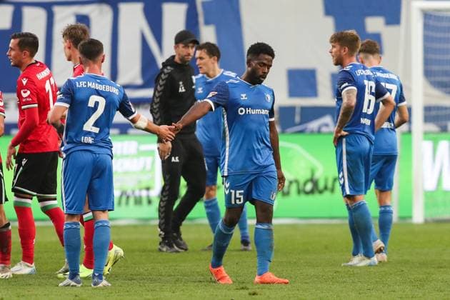 Daniel Heber (1. FC Magdeburg,15) mit Samuel Loric (1. FC Magdeburg,2) - 2. Fussball Bundesliga Saison 2024-2025 1. FC Magdeburg vs. Hannover 96 in der Avnet Arena in Magdeburg - Aktion,Fußball,Mann,Männer,Deutschland,27.10.2024