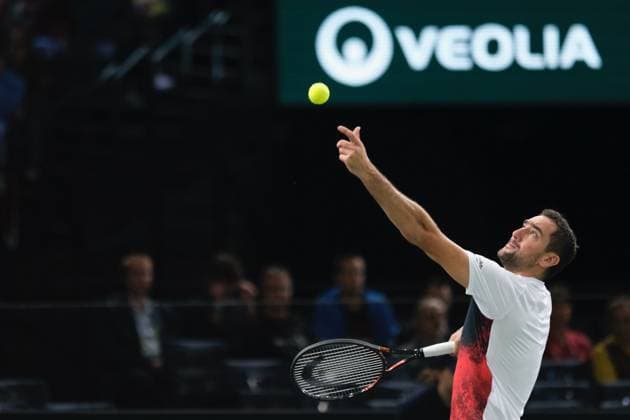 October 29, 2024, Paris, France: MARIN CILIC (CRO) returns the ball to ARTHUR FILS (FRA) during two one of Rolex Paris Masters 1000 tournament at Paris Accor Arena Stadium in Paris France Paris France - ZUMAp119 20241029_zaf_p119_017 Copyright: xPierrexSteveninx