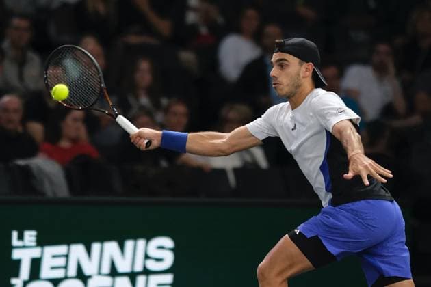 October 31, 2024, Paris, France: FRANCISCO CERUNDOLO (ARG) returns the ball to STEFANOS TSITSIPAS (GRE) during the round of sixteen of Rolex Paris Masters 1000 tournament at Paris Accor Arena Stadium in Paris France Paris France - ZUMAp119 20241031_zaf_p119_009 Copyright: xPierrexSteveninx