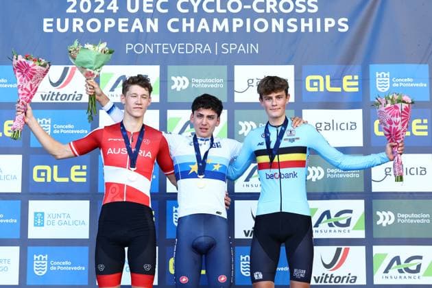 Austrian Valentin Hofer, Italian Mattia Agostinacchio and Belgian Mats Vanden Eynde celebrate on the podium after the men junior race at the European Championships cyclocross cycling in Pontevedra, Spain, Sunday 03 November 2024. DAVIDxPINTENS  x104421905x