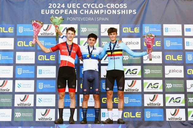 Austrian Valentin Hofer, Italian Mattia Agostinacchio and Belgian Mats Vanden Eynde celebrate on the podium after the men junior race at the European Championships cyclocross cycling in Pontevedra, Spain, Sunday 03 November 2024. DAVIDxPINTENS  x104422475x