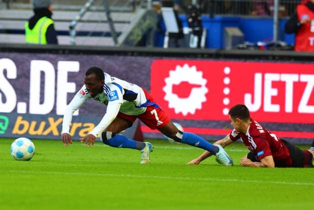 GER, Hamburg, Fussball, DFB, HSV vs 1. FC Nuernberg, im Volkspark Stadion, 03.11.2024, v.l. Jean-Luc Dompe (Hamburger SV) wird gefault DFL regulations prohibit any use of photographs as image sequences and or quasi-video.