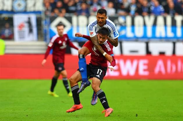 GER, Hamburg, Fussball, DFB, HSV vs 1. FC Nuernberg, im Volkspark Stadion, 03.11.2024, v.l. Jens Castrop (1. FC Nuernberg) , Davie Selke (Hamburger SV) wird gefault DFL regulations prohibit any use of photographs as image sequences and or quasi-video.