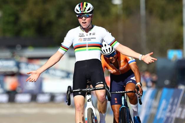 Dutch Fem Van Empel celebrates as she crosses the finish line to win, before Dutch Ceylin Del Carmen Alvarado (rear) the Women Elite race at the European Championships cyclocross cycling in Pontevedra, Spain, Sunday 03 November 2024. DAVIDxPINTENS  x104435271x