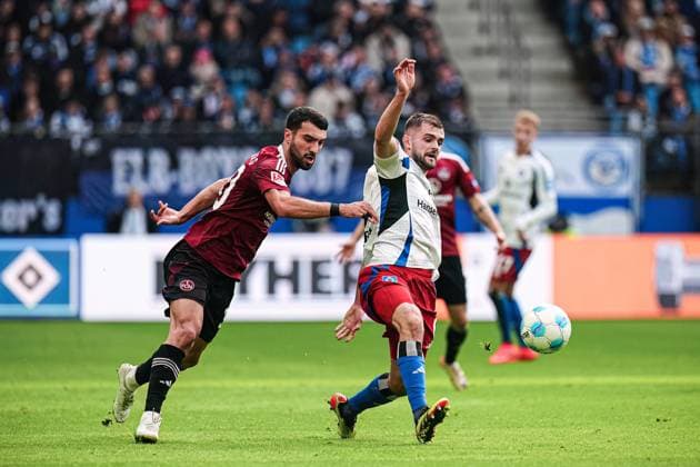 Danilo Soares (1. FC Nuernberg, 03), Lukasz Poreba (Hamburger SV, 06) GER, Hamburger SV vs. 1. FC Nuernberg, Fussball, 2. Bundesliga, Spieltag 11, Saison 2024 2025, 03.11.2024 DFL REGULATIONS PROHIBIT ANY USE OF PHOTOGRAPHS AS IMAGE SEQUENCES AND OR QUASI-VIDEO GER, Hamburger SV vs. 1. FC Nuernberg, Fussball, 2. Bundesliga, Spieltag 11, Saison 2024 2025, 03.11.2024 Hamburg