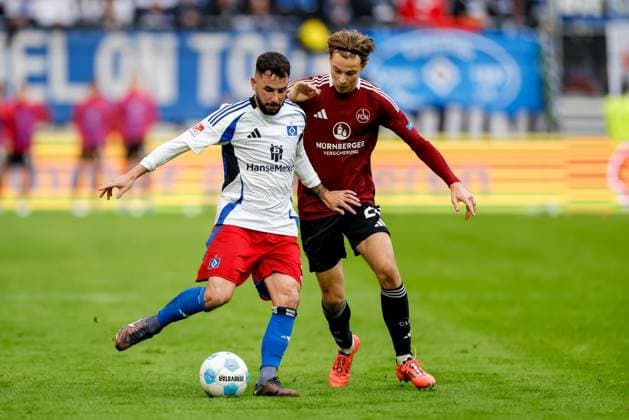 Hamburg, 3. November 2024 - Fußball, 2. Bundesliga 2024 25, Hamburger SV - 1. FC Nürnberg: Marco Richter (Hamburger SV, 20), Caspar Jander (1. FC Nürnberg, 20) DFL REGULATIONS PROHIBIT ANY USE OF PHOTOGRAPHS AS IMAGE SEQUENCES AND OR QUASI-VIDEO.