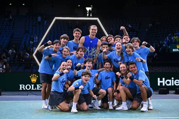 Final Of The Rolex Paris Masters Alexander Zverev (GER) poses with his trophy and the ball kids at the 2024 Rolex Paris Masters at the Accor Arena in Paris, France, on November 3, 2024. Photo by Corinne Dubreuil ABACAPRESS.COM Paris France  Copyright: xDubreuilxCorinne ABACAx