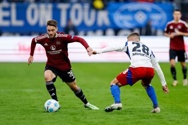 Hamburg, 3. November 2024 - Fußball, 2. Bundesliga 2024 25, Hamburger SV - 1. FC Nürnberg: Lukas Schleimer (1. FC Nürnberg, 36), Miro Muheim (Hamburger SV, 28) DFL REGULATIONS PROHIBIT ANY USE OF PHOTOGRAPHS AS IMAGE SEQUENCES AND OR QUASI-VIDEO.