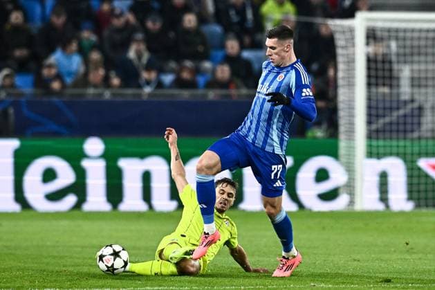 SK Slovan Bratislava v GNK Dinamo - UEFA Champions League 2024 25 League Phase MD4 Dario Spikic of Dinamo Zagreb and Danylo Ihnatenko of Slovan Bratislava in action during the UEFA Champions League 2024 25 League Phase MD4 match between SK Slovan Bratislava and GNK Dinamo at National football stadium on November 5, 2024 in Bratislava, Slovakia.  MarkoxLukunic PIXSELL