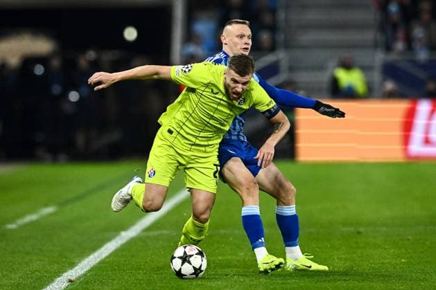 SK Slovan Bratislava v GNK Dinamo - UEFA Champions League 2024 25 League Phase MD4 Stefan Ristovski of Dinamo Zagreb competes for the ball with Nino Marcelli of Slovan Bratislava during the UEFA Champions League 2024 25 League Phase MD4 match between SK Slovan Bratislava and GNK Dinamo at National football stadium on November 5, 2024 in Bratislava, Slovakia.  MarkoxLukunic PIXSELL