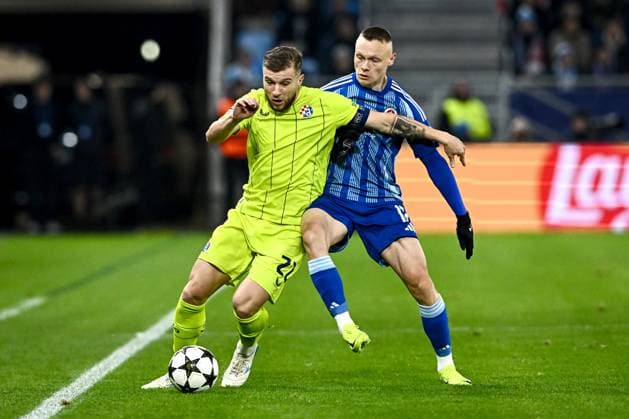 SK Slovan Bratislava v GNK Dinamo - UEFA Champions League 2024 25 League Phase MD4 Stefan Ristovski of Dinamo Zagreb competes for the ball with Nino Marcelli of Slovan Bratislava during the UEFA Champions League 2024 25 League Phase MD4 match between SK Slovan Bratislava and GNK Dinamo at National football stadium on November 5, 2024 in Bratislava, Slovakia.  MarkoxLukunic PIXSELL