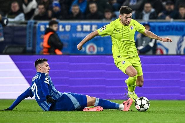 SK Slovan Bratislava v GNK Dinamo - UEFA Champions League 2024 25 League Phase MD4 Martin Baturina of Dinamo Zagreb is challenged by Danylo Ihnatenko of Slovan Bratislava during the UEFA Champions League 2024 25 League Phase MD4 match between SK Slovan Bratislava and GNK Dinamo at National football stadium on November 5, 2024 in Bratislava, Slovakia.  MarkoxLukunic PIXSELL