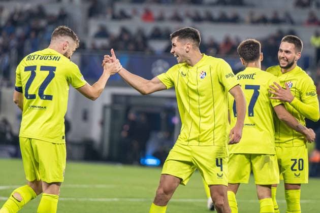 GNK Dinamo Zagreb players a goal celebrate during UEFA Champions league match, SK Slovan Bratislava - GNK Dinamo Zagreb , 05. november 2024, Tehelne pole Stadium, Bratislava, Slovakia Copyright: xMICHALxFAJT,ZOSPORTU.SKx FAJ_4440