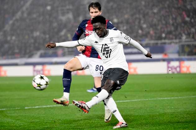 Soungoutou Magassa of AS Monaco FC and Giovanni Fabbian of Bologna FC during the Champions League football match between Bologna FC and AS Monaco FC at Renato Dall Ara stadium in Bologna (Italy), November 5, 2024. andreaxstaccioli