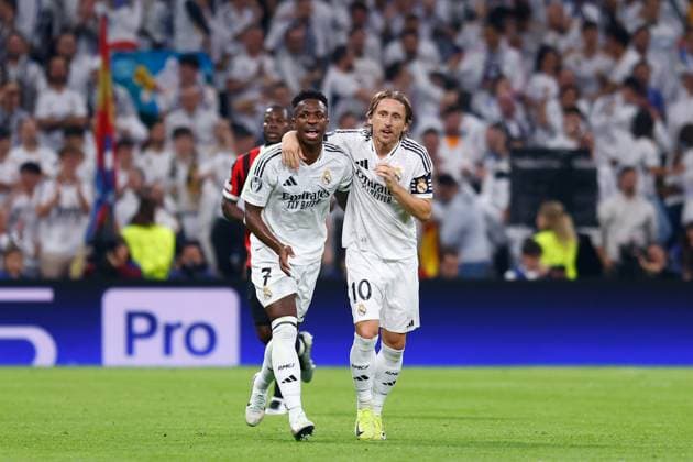 November 5, 2024, Madrid, Madrid, SPAIN: Vinicius Junior and Luka Modric of Real Madrid celebrate a goal during the UEFA Champions League 2024 25 League Phase MD4 match between Real Madrid CF and AC Milan at Estadio Santiago Bernabeu on November 5, 2024, in Madrid, Spain. Madrid SPAIN - ZUMAa181 20241105_zaa_a181_023 Copyright: xDennisxAgyemanx