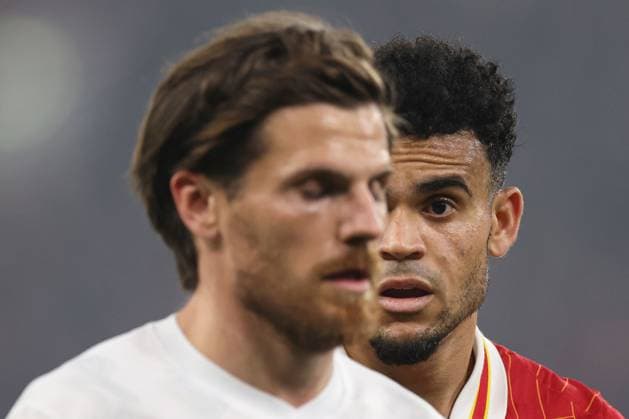 Luis Diaz of Liverpool behind Jonas Hofmann of Bayer 04 Leverkusen as they show a look of dejection Liverpool v Bayer 04 Leverkusen, UEFA Champions League, Group Stage, Football, Anfield, Liverpool, UK - 05 Nov 2024 EDITORIAL USE ONLY No use with unauthorised audio, video, data, fixture lists, club league logos or live services. Online in-match use limited to 120 images, no video emulation. No use in betting, games or single club league player publications. Copyright: xPaulxCurrie Shutterstockx 14863785ej
