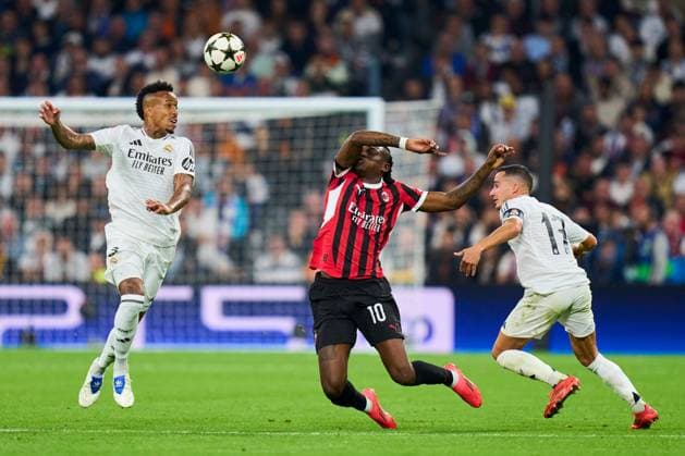 Rafael Leao of AC Milan and Lucas Vazquez and Eder Militao of Real Madrid CF Real Madrid v AC Milan, UEFA Champios League match, date 4. Football, Santiago Bernabeu Stadium, Madrid, Spain - 5 Nov 2024 Editorial use only  Copyright: xPressinphoto Shutterstockx 14869602bi