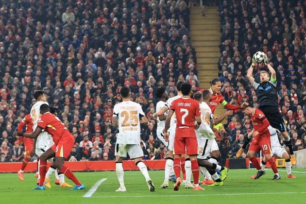 5th November 2024; Anfield, Liverpool, Merseyside, England; Champions League Football, Liverpool versus Bayer Leverkusen; Bayer Leverkeusen goalkeeper Lukas Hradecky leaps to claim a cross  ActionPlus12712469 DavidxBlunsden