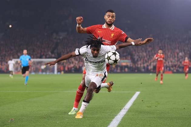 Football - UEFA Champions League - League Phase - Liverpool v Bayer Leverkusen 5th November 2024 - UEFA Champions League - League Phase - Liverpool v Bayer Leverkusen - Cody Gakpo of Liverpool battles with Jeremie Frimpong of Bayer Leverkusen - Photo: Simon Stacpoole Offside. Liverpool UK Copyright: xSimonxStacpoolexOffside