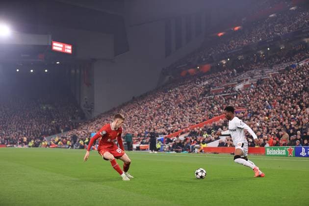 Football - UEFA Champions League - League Phase - Liverpool v Bayer Leverkusen 5th November 2024 - UEFA Champions League - League Phase - Liverpool v Bayer Leverkusen - Nathan Tella of Bayer Leverkusen battles with Conor Bradley of Liverpool inside Anfield - Photo: Simon Stacpoole Offside. Liverpool UK Copyright: xSimonxStacpoolexOffside