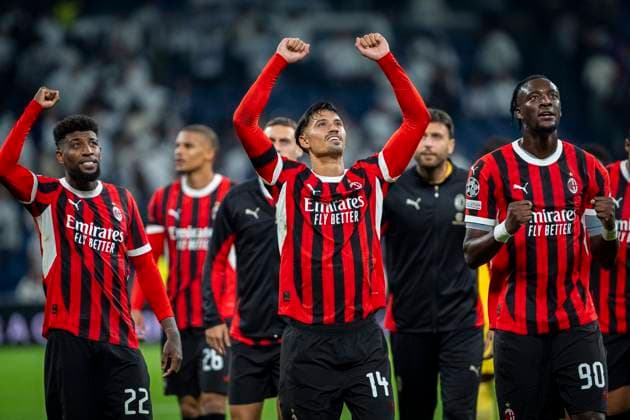 Real Madrid C.F. v AC Mailand - UEFA Champions League 2024 25 League Phase MD3 Players of AC Milan (from L to R) Emerson Royal, Tijjani Reijnders, Tammy Abraham celebrate the victory at the end of the UEFA Champions League 2024 25 League Phase MD4 match between Real Madrid C.F. and AC Milan at Estadio Santiago Bernabeu on November 5, 2024 in Madrid, Spain. Madrid Estadio Santiago Bernabeu Madrid Spain Copyright: xAlbertoxGardinx AGardin_20241105_Football_Champions_Real_Madrid_Milan_764