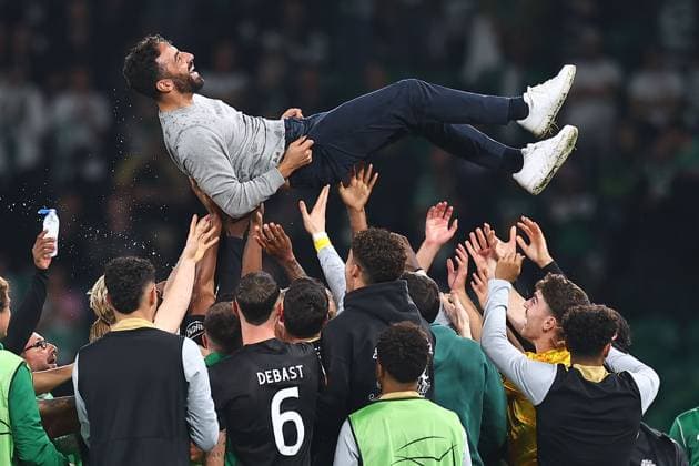 Ruben Amorim manager of Sporting Lisbon is thrown in the air after the match Sporting Lisbon v Manchester City, UEFA Champions League, Group Stage, Football, Estadio Jose Alvalade, Lisbon, Portugal - 05 Nov 2024 EDITORIAL USE ONLY No use with unauthorised audio, video, data, fixture lists, club league logos or live services. Online in-match use limited to 120 images, no video emulation. No use in betting, games or single club league player publications.  Copyright: xMichaelxZemanek Shutterstockx 14863776ce