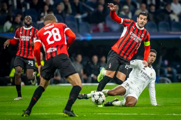 Real Madrid CF vs AC Milan- UEFA Champions League - 05 11 2024 Theo Hernandez of AC Milan (L) battles for the ball with Jude Bellingham of Real Madrid CF (R) during the UEFA Champions League match between Real Madrid CF and AC Milan at Estadio Santiago Bernabeu on November 05, 2024 in Madrid, Spain. Madrid Spain Copyright: xPGSxPhotoxagencyx