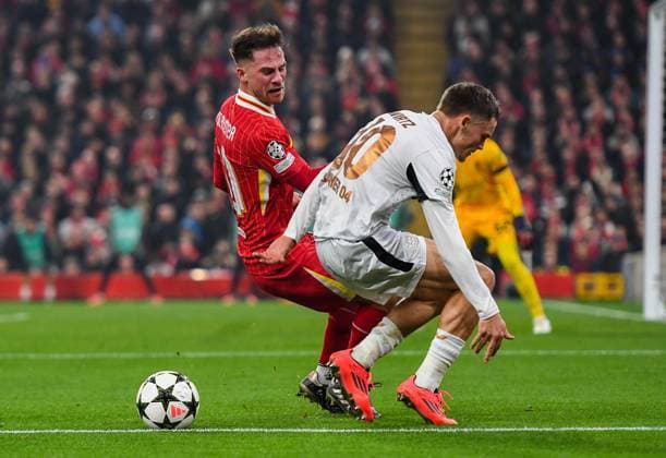 Liverpool v Bayer Leverkusen UEFA Champions League Alexis Mac Allister of Liverpool and Florian Wirtz of Bayern Leverkusen during the UEFA Champions League match at Anfield, Liverpool UK Newspapers OUT Copyright: xKarlxVallantinex FIL-20882-0066